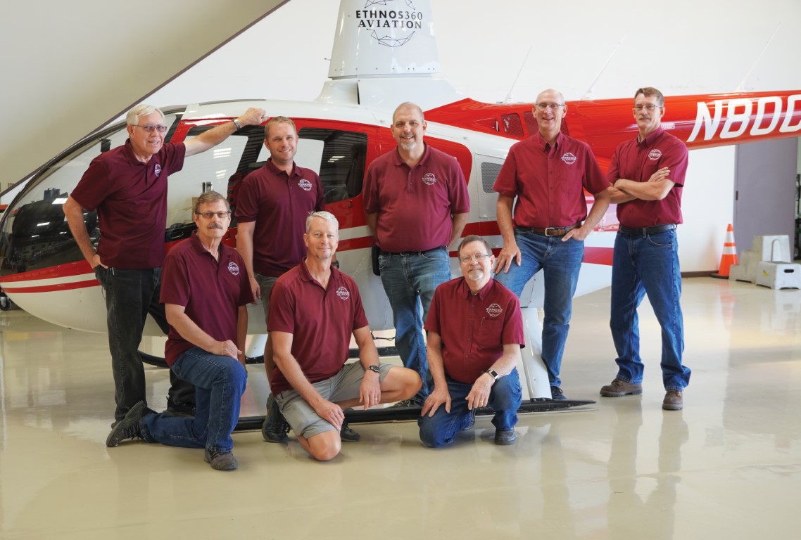 Back row from left to right: Tim Hughes (Director of Operations), Brian Pruett (International Rotor Wing Chief Pilot), Ron James (Director of Safety), Jeff Schaa (Director of Finance), Jim Stewart (International Director of Maintenance) Front row from left to right: Dwight Brown (Director of Personnel/HR), Daren Spence (International Fixed Wing Chief Pilot), Phil Koop (Executive Director) Back row from left to right: Tim Hughes (Director of Operations), Brian Pruett (International Rotor Wing Chief Pilot), Ron James (Director of Safety), Jeff Schaa (Director of Finance), Jim Stewart (International Director of Maintenance) Front row from left to right: Dwight Brown (Director of Personnel/HR), Daren Spence (International Fixed Wing Chief Pilot), Phil Koop (Executive Director)
