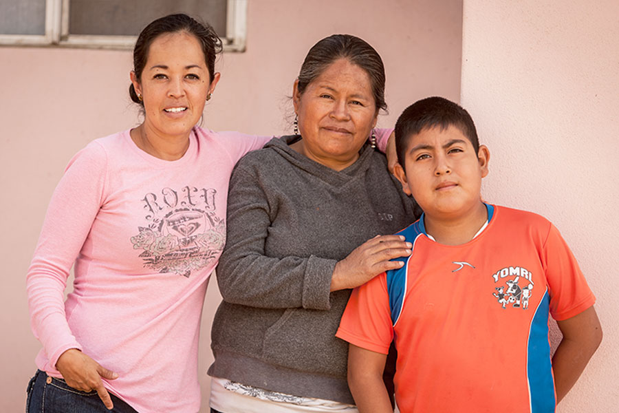 two women and a young man
