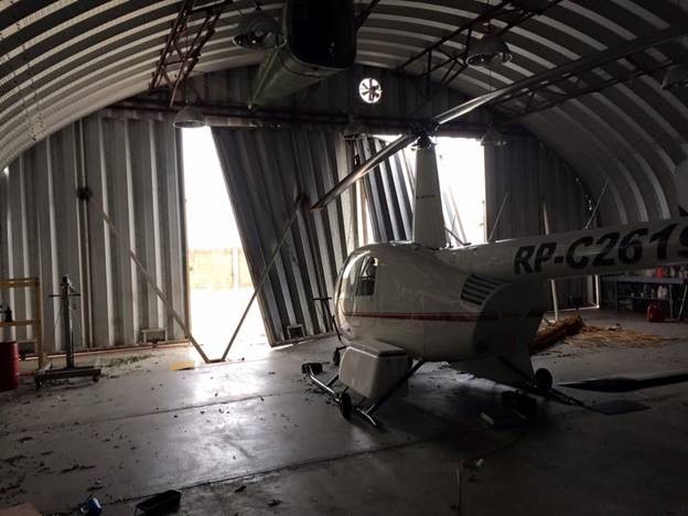 Hangar doors hanging by a thread