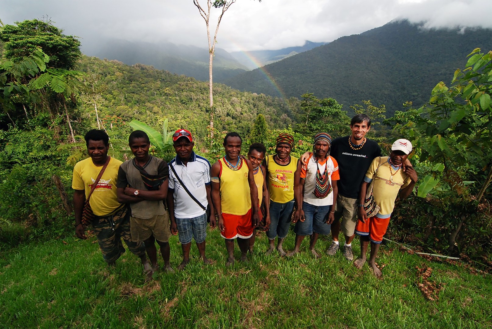 Men in front of a Rainbow